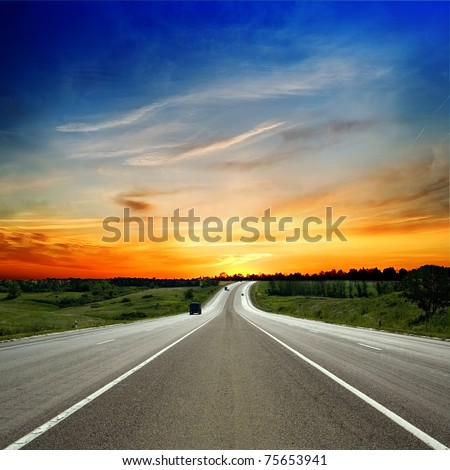 paved road between the hills Royalty-Free Stock Photo #75653941