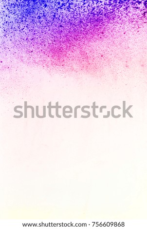 abstract powder splatted background. Colorful powder explosion on white background. Colored cloud. Colorful dust explode. Paint Holi.
