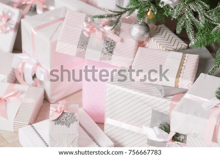 Christmas Gifts under the tree. Concept New Year celebration background.