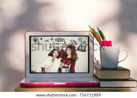 E-Learning and digital lifestyle Concept. two Asian students with education and E-learning illustration doodles in the laptop computer with bokeh wall back ground
