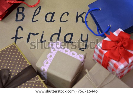 Black Friday handwritten , sales concept. shopping. boxes with gifts. shopping bags