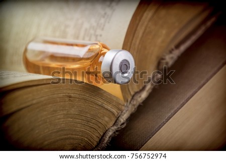  Vial On An Old Book Of Medicine, Conceptual Image 