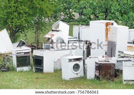 Dump of scrap metal and household appliances Royalty-Free Stock Photo #756786061