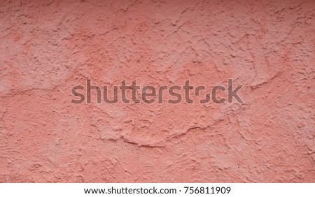 The external wall is covered with plaster or mortar.