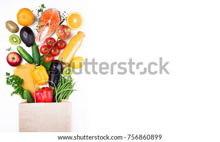 Healthy food background. Healthy food in paper bag fish, vegetables and fruits on white. Shopping food supermarket concept. Long format with copy space Royalty-Free Stock Photo #756860899