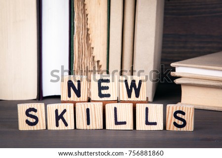 new skills, wooden letters on wooden table. Education, success and communication background