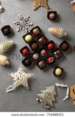Holiday chocolate on christmas background, food above