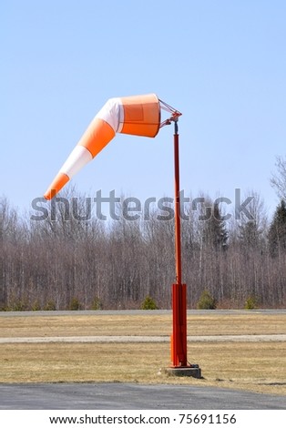 windsock at the Airport low wind, early Spring season