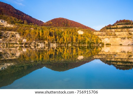 Reflection of hill in water