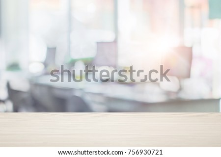 Businessmen blur in the workplace or burred table work in office room with computer or shallow depth of de focus abstract background.