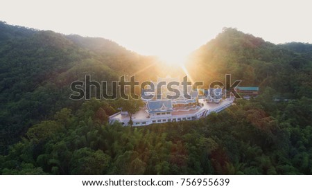 Wat Pa Phu Kon In Ubon Ratchathani,Thailand.Is a public temple. In the middle of the forest is beautiful. And is popular with tourists.The morning sun shines from the hills.