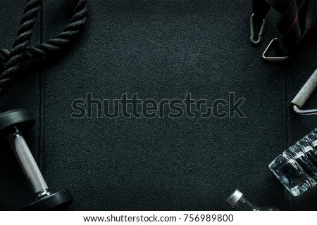 CrossFit Equipment on floor in Gym. Royalty-Free Stock Photo #756989800