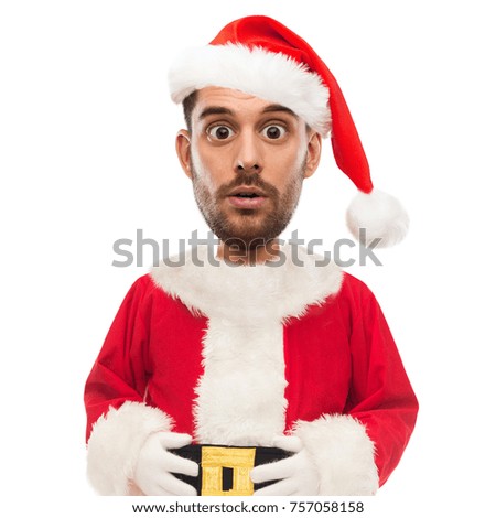 christmas, emotion, facial expressions and people concept - surprised man in santa claus costume over white (funny cartoon style character with big head)