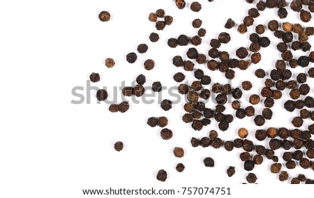 Black pepper isolated on white background, top view