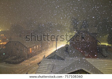 Snowy winter night in small town near Sarajevo , Bosnia and Herzegovina