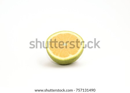 Half of cut lemon isolated on white