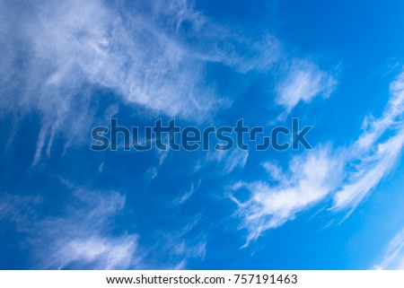 Aerial shoot. Blue sky and cirrus clouds - the high-level, before rain or snowfall.
