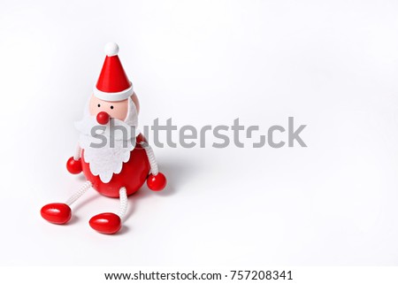 Wooden figurine of Christmas Santa Claus isolated on white background