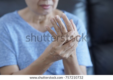 arthritis old person and Elderly woman female suffering from pain at home Royalty-Free Stock Photo #757210732