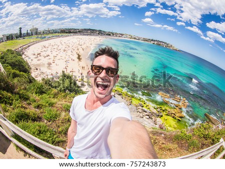 Handsome man taking a selfie on vacation