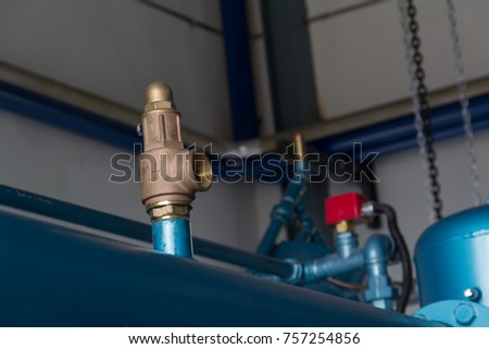 Pressure safety valve install at discharge of feed gas compressor to protect unexpected pressure form process. Royalty-Free Stock Photo #757254856