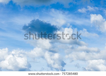 Bright sky with white clouds