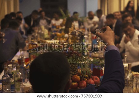 Group of people at banquet, party drinking alcohol