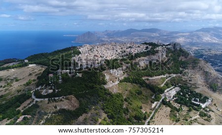 Aerial photo of mountain town Erice is historic town and comune in the province of Trapani in Sicily Italy the main town of Erice is located on top of Mount Erice at around 750 metres above sea level Royalty-Free Stock Photo #757305214