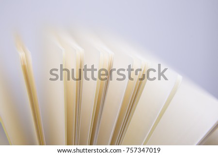 A beautiful closeup of a blank notebook in green covers.  Shallow depth of field photo.