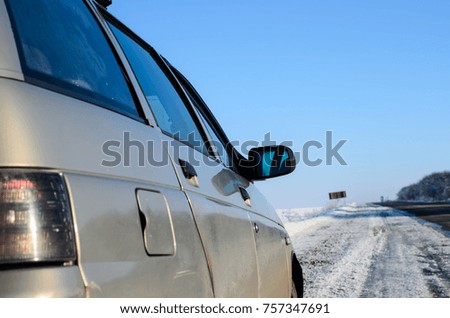 Car on a side of the road on winter