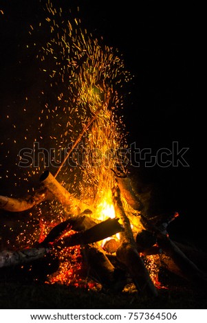 bonfire, build a fire on the lawn, camping Royalty-Free Stock Photo #757364506