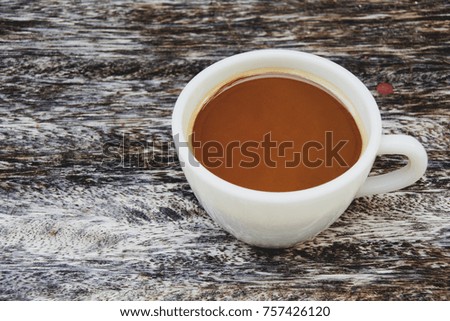 Coffee cup on brown wooden. Drink for relax in free time or work concept.