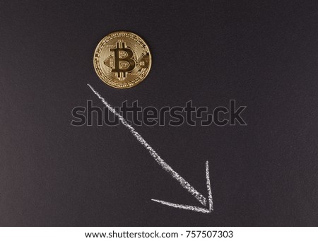 Golden bitcoin with arrow down. Concept of cryptocurrency lesion and fall of.