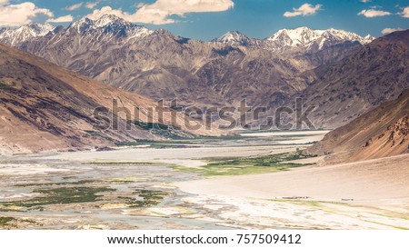 Beautiful view of the Pamir, Afghanistan and Panj River along the Wachan Corridor Royalty-Free Stock Photo #757509412