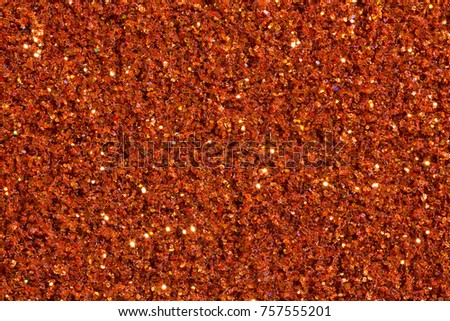 Saturated brick-colour background with glitter. High resolution photo.