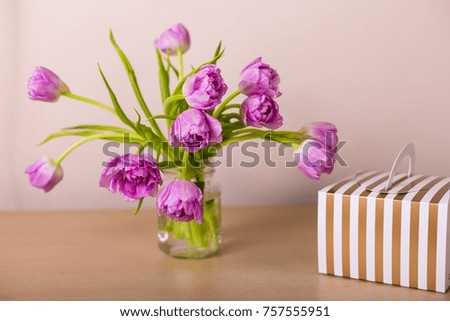 Bouquet of fresh pink tulips in a vase