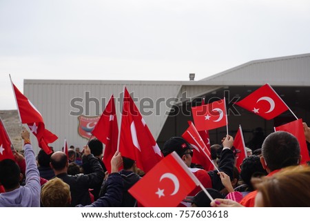 People with Turkish Flags