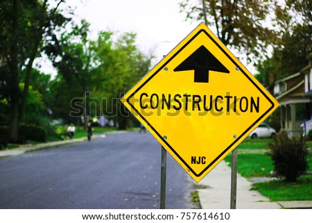 Yellow Road sign Construction ahead. 