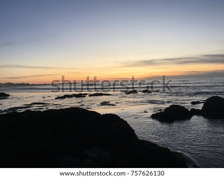 Sunset dusk rocks silhouette Royalty-Free Stock Photo #757626130