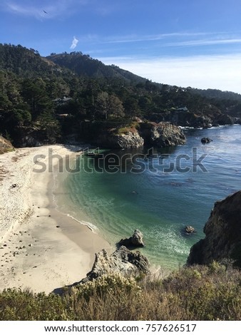 Hidden beach in a rocky coastline Royalty-Free Stock Photo #757626517
