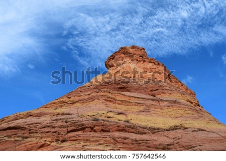 Red rock cliffs in the Arizona desert with snow. Royalty-Free Stock Photo #757642546