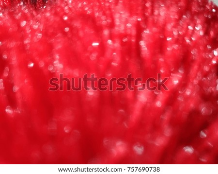 Decorative Abstract out of focus lights with Red background. Good for Christmas and New Year celebrations. 