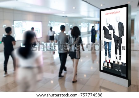 Intelligent Digital Signage , Augmented reality marketing and face recognition concept. Interactive artificial intelligence digital advertisement in retail shopping Mall. Royalty-Free Stock Photo #757774588