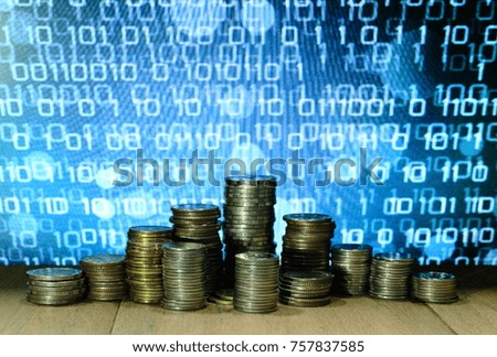 Digital economy. Coin stack with blue binary digital numbers background. Business, finance and saving concept.