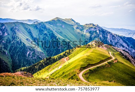 Mountain path on hill in summer landscape Royalty-Free Stock Photo #757853977