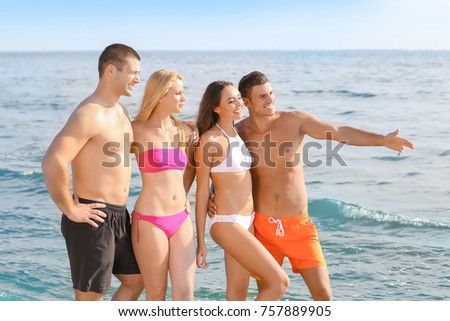 Group of attractive young people on beach