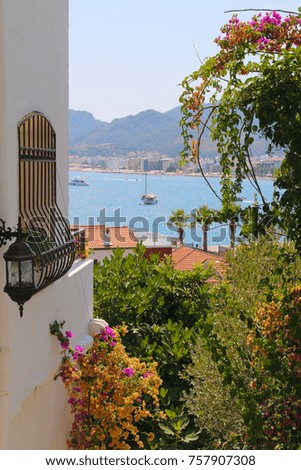 The picture was taken in the old part of Marmaris. On the photo a view from the window to the sea bay.