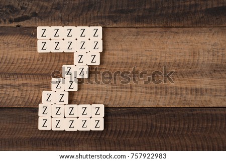 group of alphabet tiles letter Z - letter Z day concept