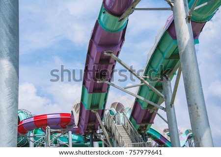 water slide with blue sky in water park
