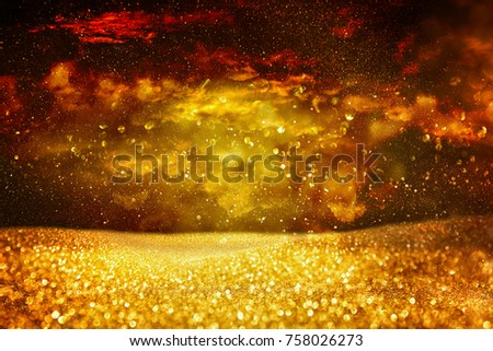 Gold glitter vintage lights background. de focused